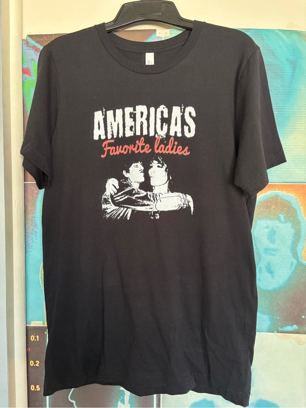 America's Favorite Ladies Black Graphic Tee Jake and Johnnie merch